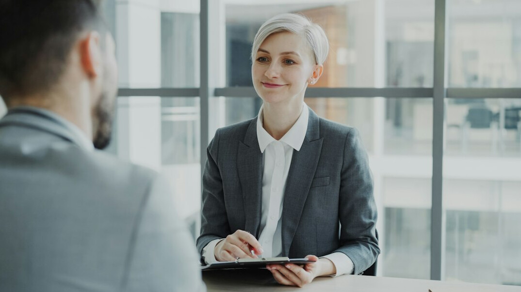 detective interviewing employee