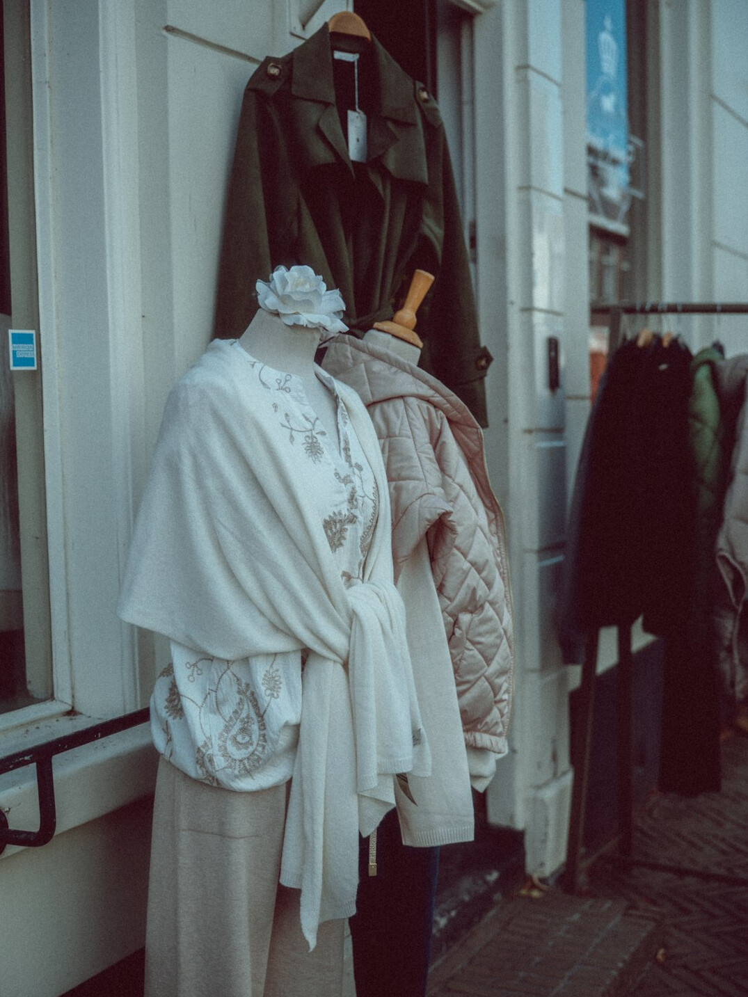 elderly person in clothing store