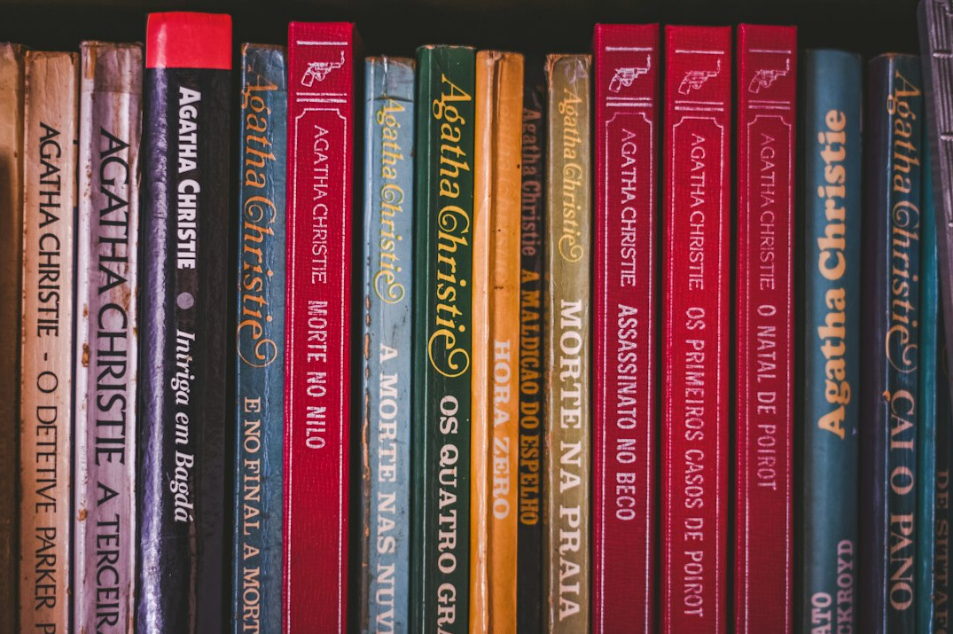 Rows of books on a library shelf