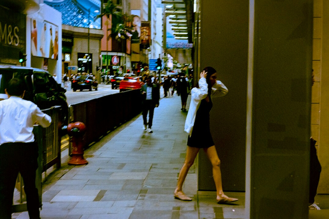 store security guard watching shoppers