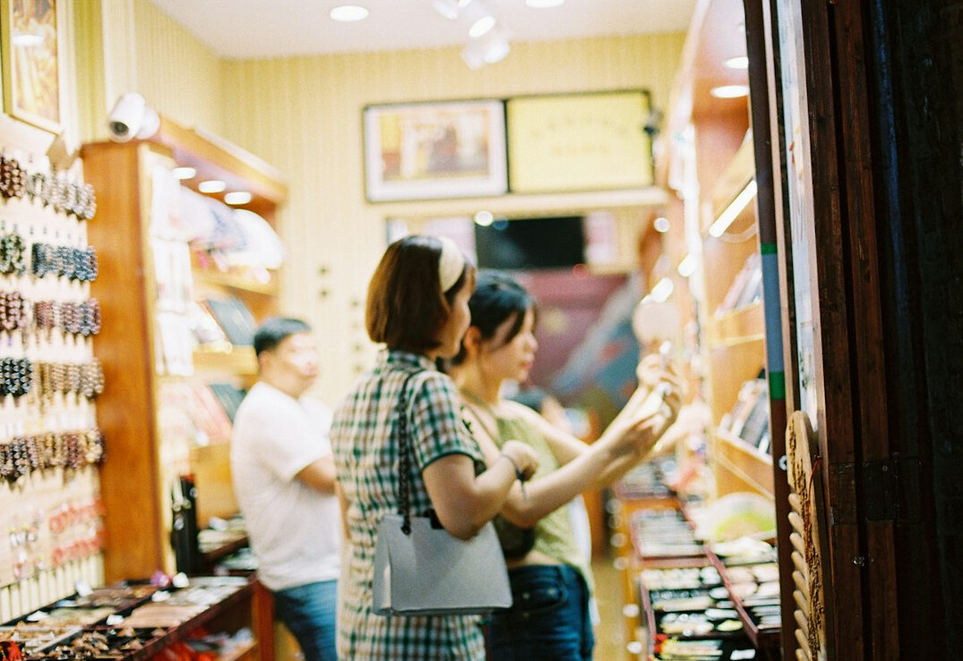 store detective observing customers